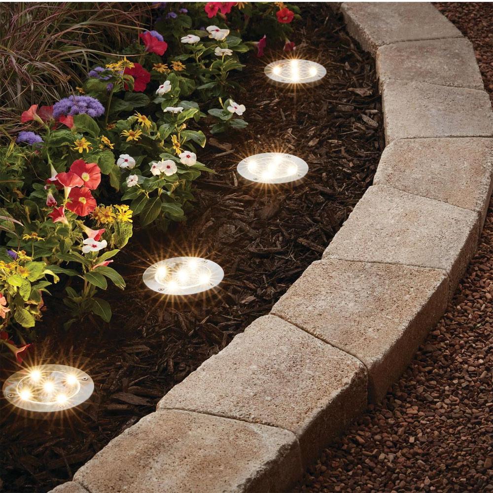 Mainstays Solar Powered LED Landscape Disc Lights 4 Pack for $8.86